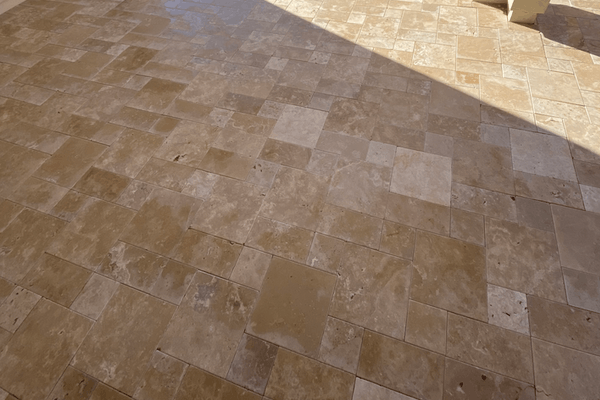 Patio pavers and travertine tile, design and install services for Arizona.